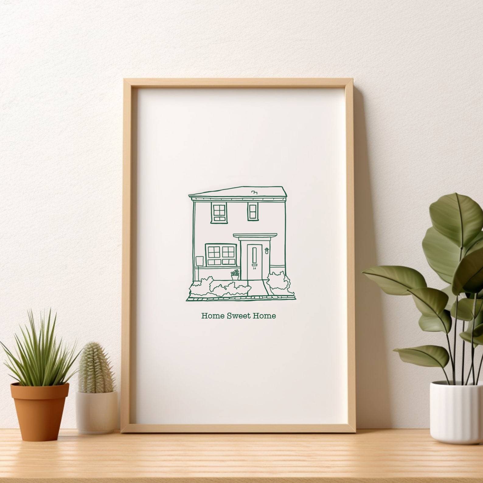 Small house illustration print in a frame